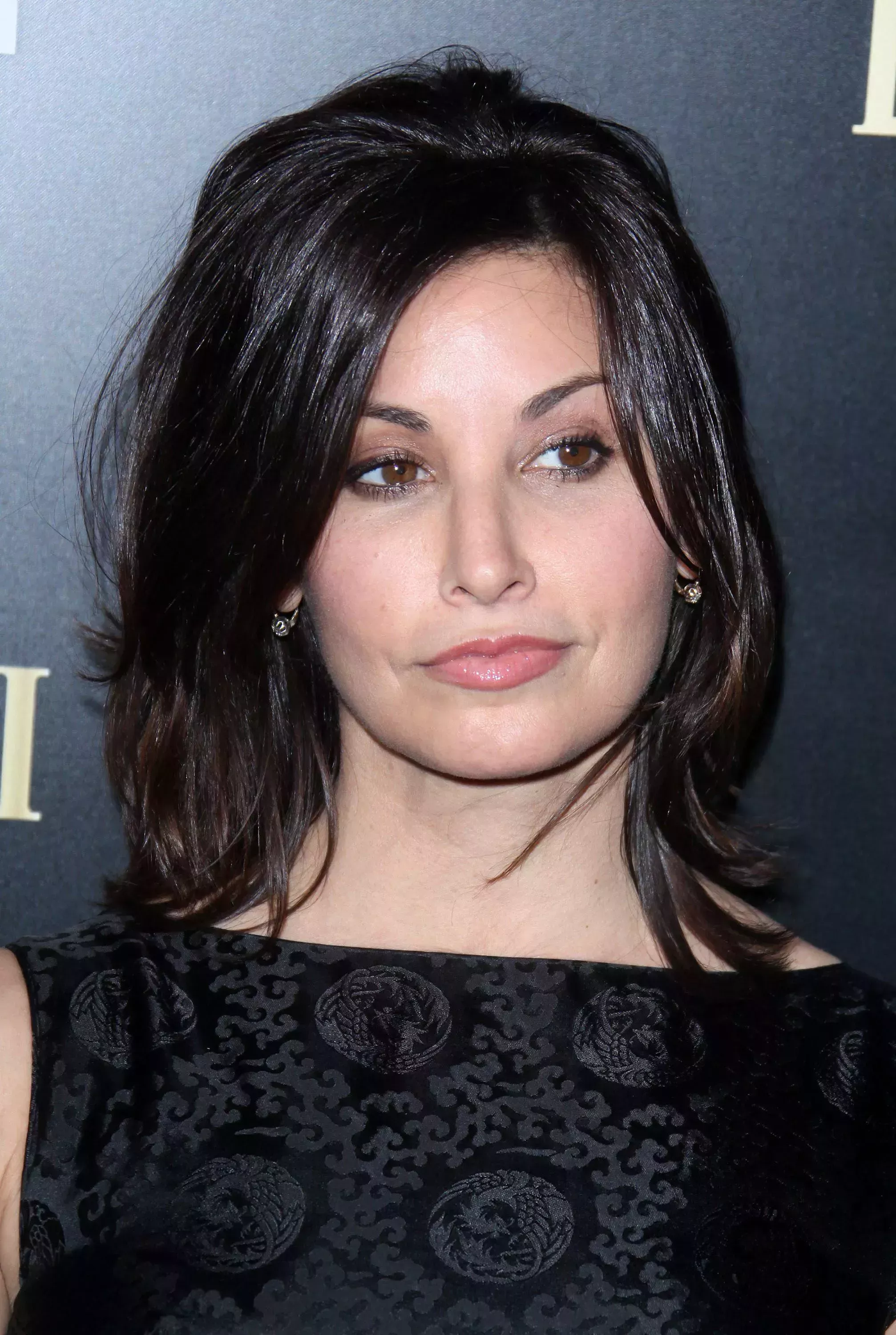 Fluffed Shag with Twin Fringe by Gina Gershon