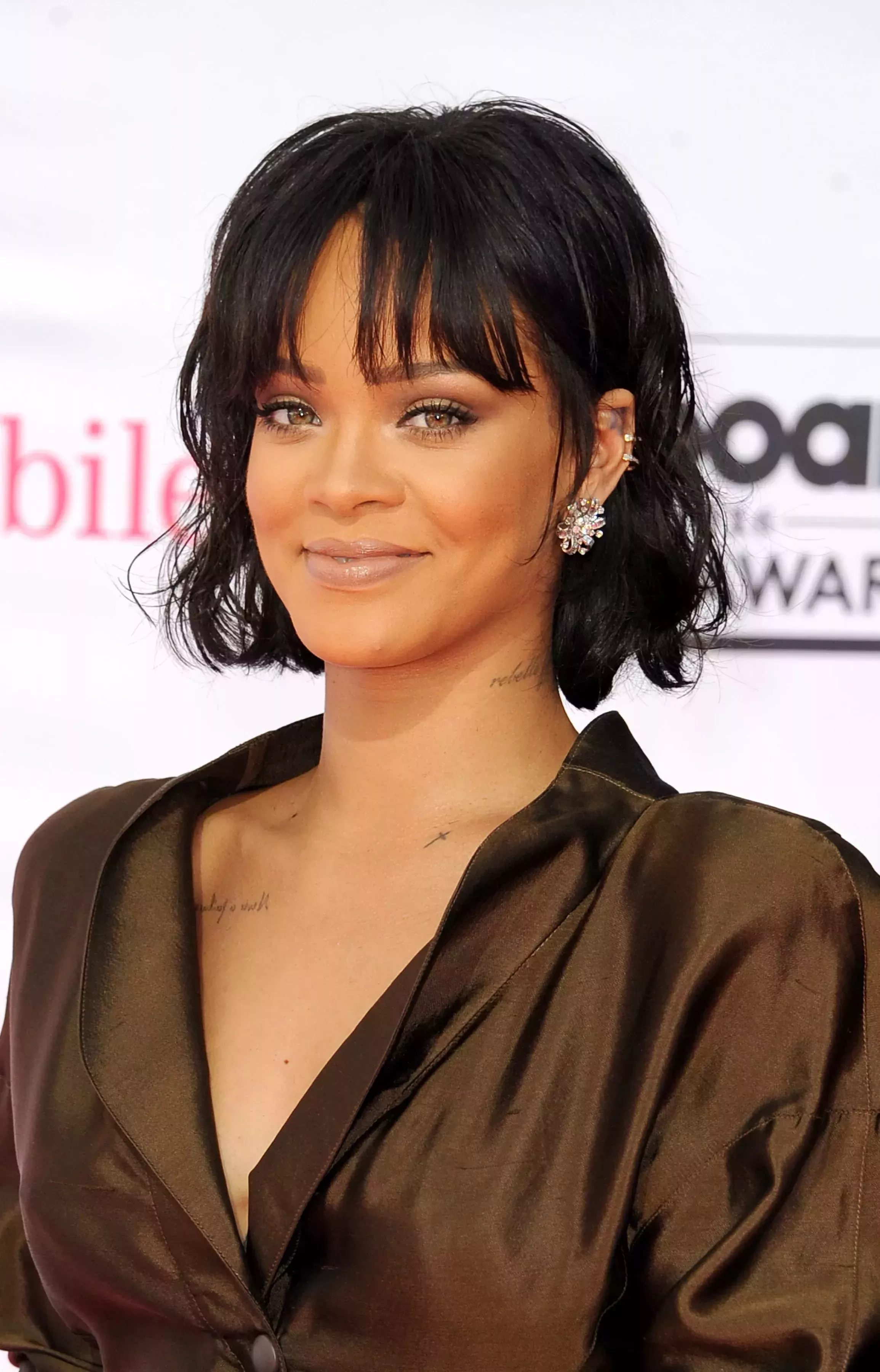 Rihanna’s Short Curly Bob with Bangs