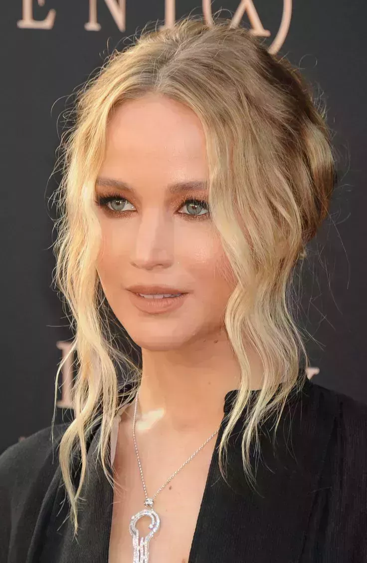 Jennifer Lawrence’s Updo with Long Bangs