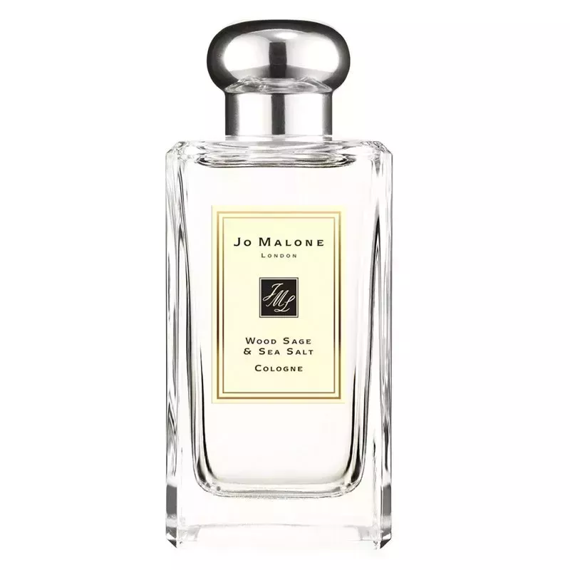A clear glass perfume bottle of the Jo Malone London Wood Sage & Sea Salt Cologne on a white background