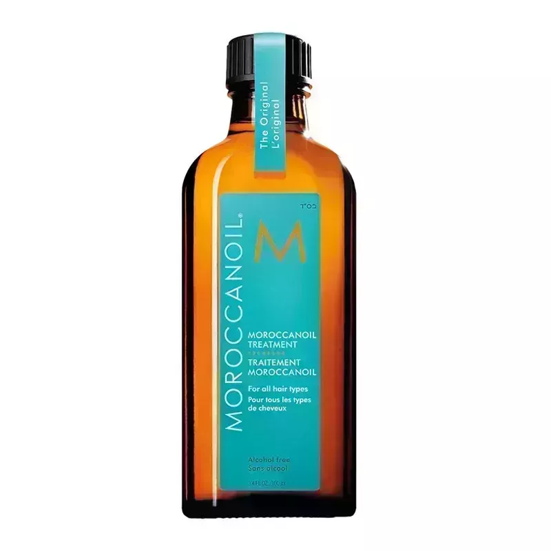 A brown and blue bottle of the Moroccanoil Treatment on a white background