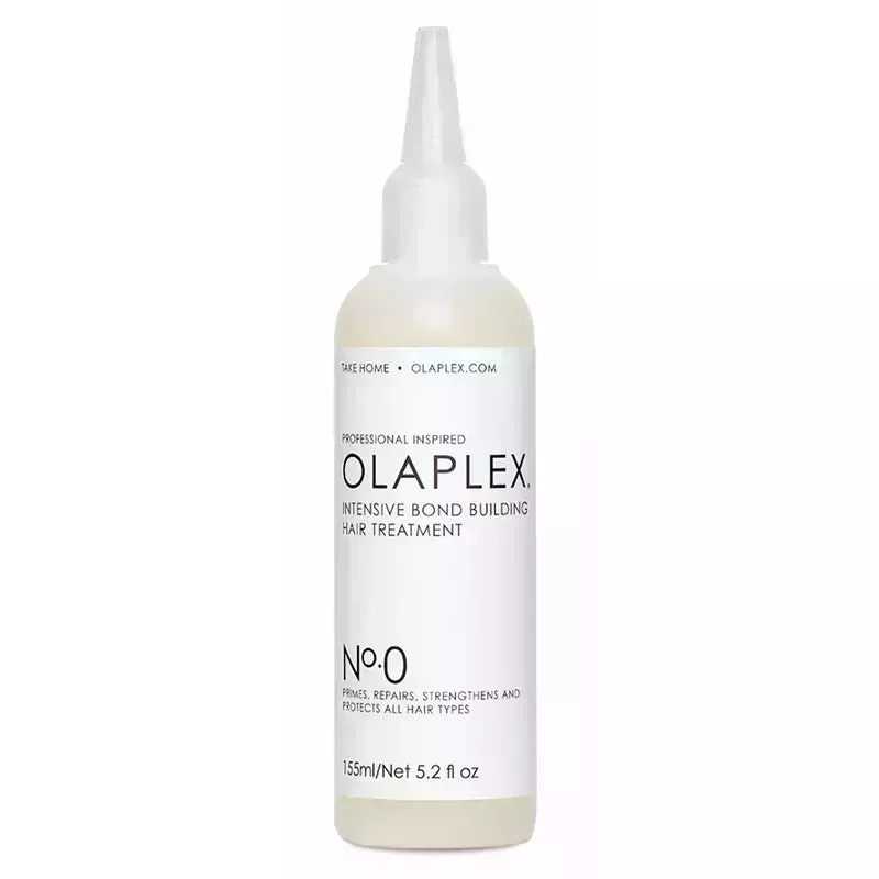 A white bottle with tapered tip of the Olaplex No. 0 Intensive Bond Building Hair Treatment on a white background