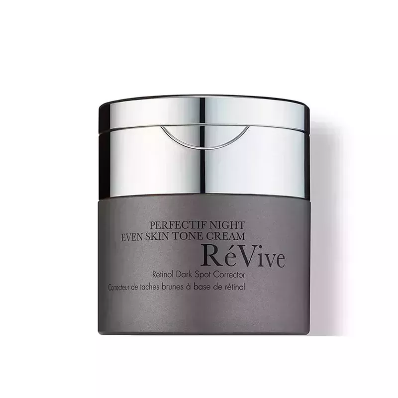 RéVive Perfectif Night Even Skin Tone Cream: A gray jar with silver cap and black text on a white background