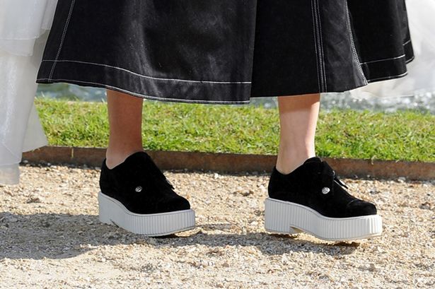 amodelpresentsacreationbykarllagerfeldaspartofnewcruisecollectionshowforchanel