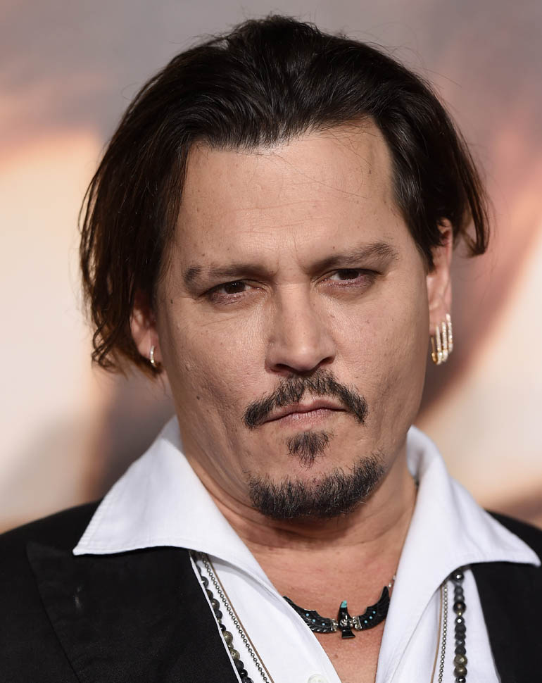 Amber Heard denuncia a Johnny Depp por maltrato 
