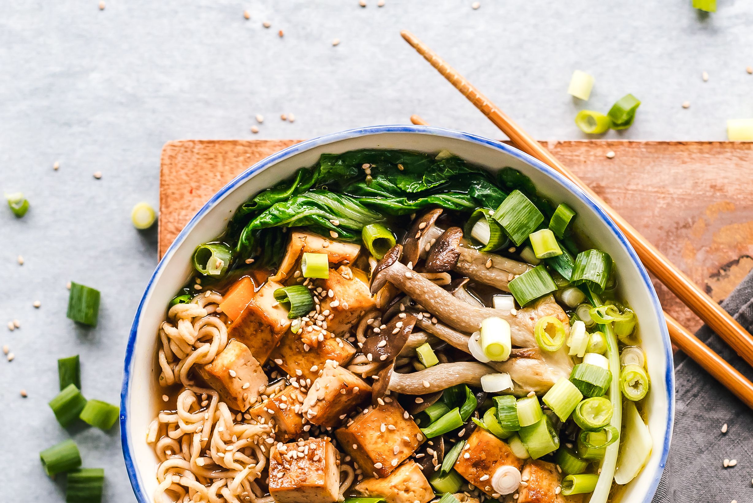 Bowl of vegan miso ramen with tofu and mushrooms