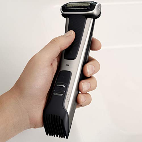 Philips Serie 7000 BG7025/15 - Afeitadora corporal con cabezal de recorte y de afeitado, 80 minutos de uso, apta para la ducha, color negro/dorado
