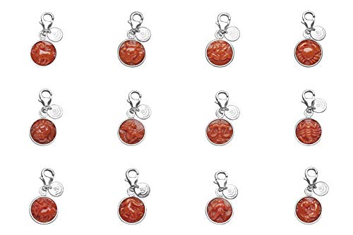 Antonino De Simone Charms zodiacales grabados en huesos de coral rojo del Mediterráneo, disponibles en oro amarillo de 18 quilates y plata blanca 925. Capricorno