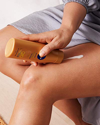 NIVEA NIVEA Body Q10 - Hidratante corporal gradual bronceado de feria a mediana