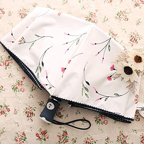 Paraguas de sol Plástico negro protector solar lluvia Parrilla de doble uso Paraguas de tres veces Súper fuerte Paraguas plegable anti-UV Chica viento Flor de sol Paraguas de cuatro colores Flor blan