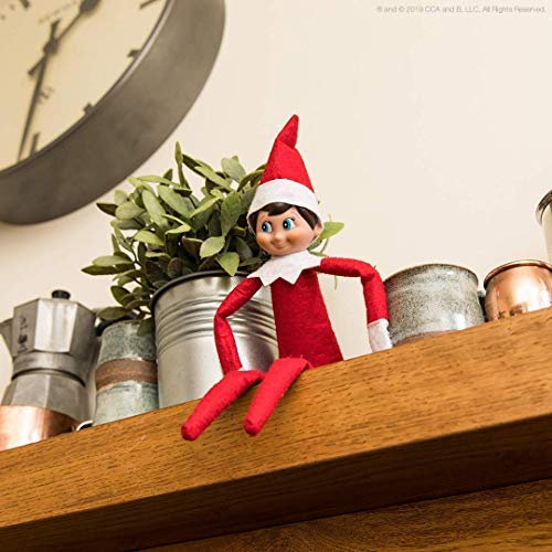 The Elf on the Shelf: Una tradición navideña (Incluye tono de piel claro chico Elf y un libro especial en Inglés)