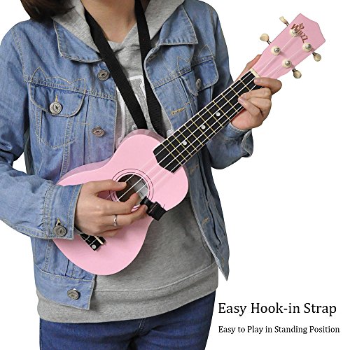 Winzz Ukelele Soprano Starter Kit para Principiante. Incluye: Funda, Afinador, Cuerdas Extra, Correa Ajustable, Púas, Pegatinas de notas, Guía de Acordes y Paño de pulido. Color: Rosa