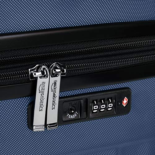 AmazonBasics - Maleta rígida giratoria prémium de 68 cm, azul marino