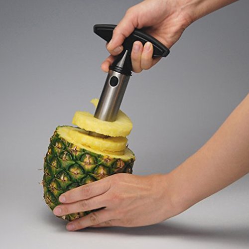 Ingenioso cortador para piña de acero inoxidable, muy práctico y fácil de usar, ideal para vaciar, pelar y rebanar una piña
