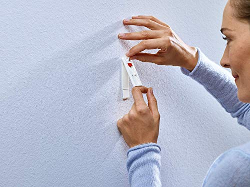 Tesa 77774 - Clavos adhesivos ajustables (para papel pintado y yeso, altura regulable, hasta 1 kg de capacidad de sujeción por clavo, 4 unidades), color blanco