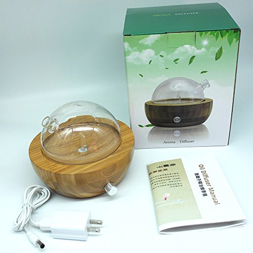 El difusor puro del aroma del aceite esencial de la nebulización de madera y del vidrio con colores cambió la luz, ninguÌ n calor, ninguna agua, ninguÌ n plástico