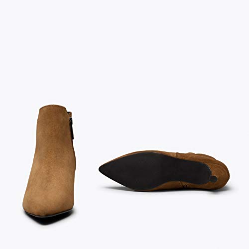 Outfit – Botín de tacón Chupete Cuero