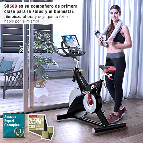 Sportstech Bicicleta estática Profesional SX500 -Marca de Calidad Alemana -Eventos en Vivo y App Multijugador, Volante de 25KG, Compatible con pulsómetro, Pedales de Click SPD, hasta 150KG, con eBook