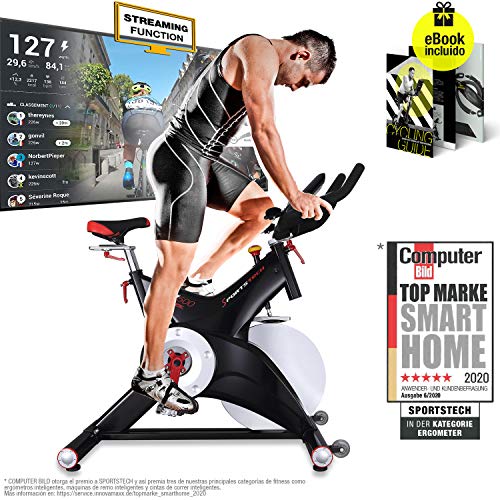 Sportstech Bicicleta estática Profesional SX500 -Marca de Calidad Alemana -Eventos en Vivo y App Multijugador, Volante de 25KG, Compatible con pulsómetro, Pedales de Click SPD, hasta 150KG, con eBook