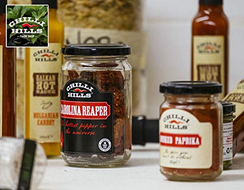 Chilli Hills chiles deshidratados CAROLINA REAPER. Los chiles más picantes del mundo cultivados en nuestro huerto familiar y deshidratados a conciencia para conservar su sabor. 15 a 18 piezas por bote