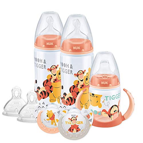 NUK Disney - Juego de chupetes y vasos para bebé (0-18 meses), diseño de Winnie the Pooh con 2 biberones, 1 taza para chupete, 2 chupetes y 2 tetinas de silicona