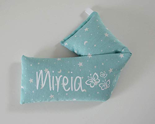 Saco térmico de semillas personalizado"tela de estrellas". Conocido como cojín térmico. Un producto 100% natural. Rellenos de semillas de trigo y hierbas aromáticas. Regalo original y hecho a mano