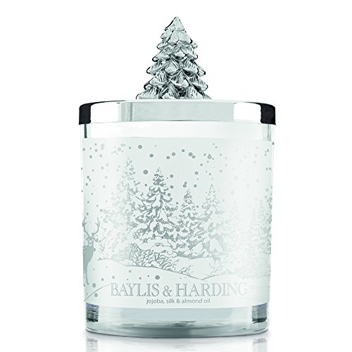 Vela perfumada (aceites de jojoba, seda y almendra) en tarro con tapa de árbol de Navidad de Baylis & Harding.