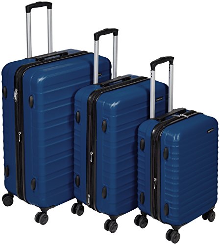 AmazonBasics - Maleta de viaje rígidaa giratoria - Juego de 3 piezas ( 55 cm, 68 cm, 78 cm), Azul marino