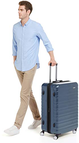 AmazonBasics - Maleta rígida de alta calidad, con ruedas y cerradura TSA incorporada - 78 cm, Azul marino