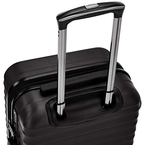 AmazonBasics - Maleta rígida giratoria prémium de 55 cm, negra