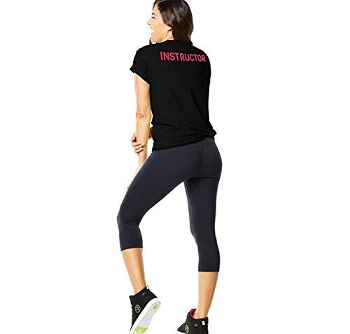 STRONG by Zumba Fitness Camiseta Unisex Transpirable de Diseño Gráfico Ropa Hombre y Mujer, Back to Black, M/L