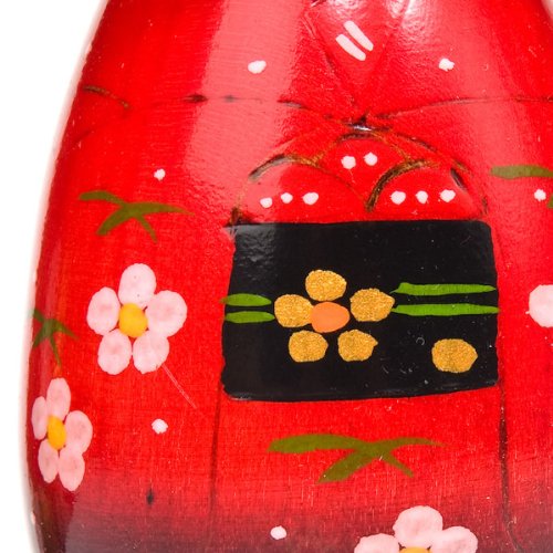 Muñeca japonesa Kokeshi con horquilla en el cabello, color rojo