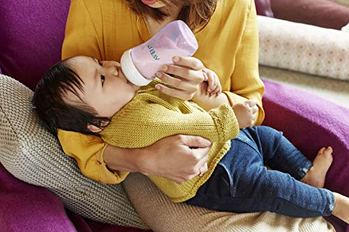 Philips Avent Biberón Natural SCF034/17 - Biberón de 260 ml con tetina con flujo para recién nacidos, diseñada para imitar el tacto del pecho, 0% BPA, 1m+, color rosa