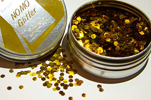 10 de purpurina dorada de tamaño grueso de origen vegetal, vegana y biodegradable para cara y cuerpo.