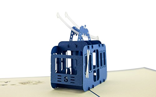 Carte postale pop up en 3D thème sports d'hiver et sports de montagne: idéal pour offrir un bon cadeau aux amateurs de ski, snowboard et randonnée en montagne. Parfait comme carte d'anniversaire.