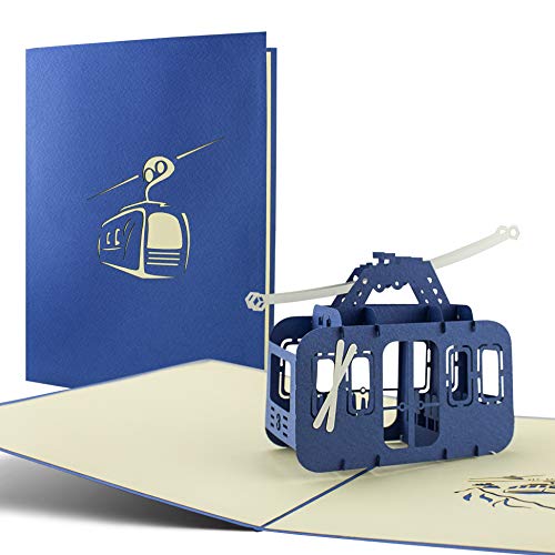 Carte postale pop up en 3D thème sports d'hiver et sports de montagne: idéal pour offrir un bon cadeau aux amateurs de ski, snowboard et randonnée en montagne. Parfait comme carte d'anniversaire.