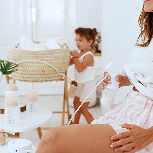 Suavinex - Pack Extractor manual de leche materna. incluye Biberon anticólicos de silicona + 3 Bolsas almacenaje con tapón + Tarro almacenaje. Sacaleches manual