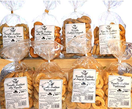 Taralli Pugliesi.Producto de panadería ideal para aperitivos La caja contiene taralli con aceite de oliva, con semillas de hinojo, con chile, grelo, pizza. PRODUCTO ITALIANO TÍPICO