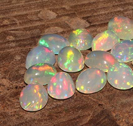 Earth Gems Park Super Fine Quality Gems Jewelry 1 Piece of Oval Shaped Natural Ethiopian Welo Fire Opal Cabochon's (7X9MM) Code:- BF-34315