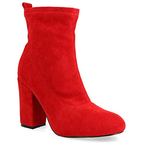 Botin de Tacon Ancho y Punta Fina, con la Cana drapeada y Remache metalico en la Parte Trasera como Detalle. Cierre de Cremallera en el Interior. Altura del Tacon: 7,5 cm. Talla 41 Camel