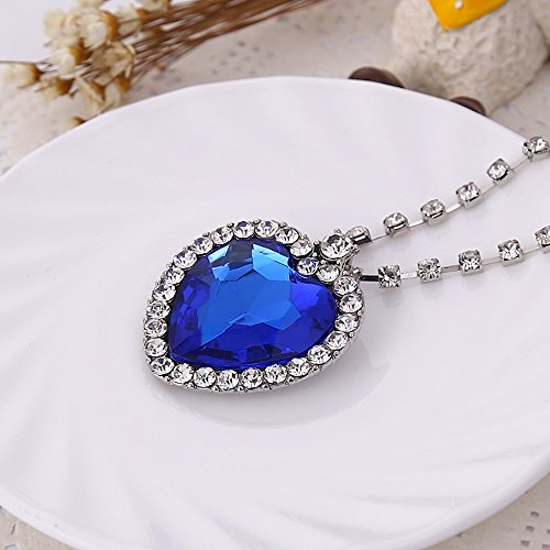 Kim Johanson Juego de joyas de acero inoxidable para mujer, diseño de corazón del océano, collar y pendientes Shamballa con circonitas, incluye paquete de regalo