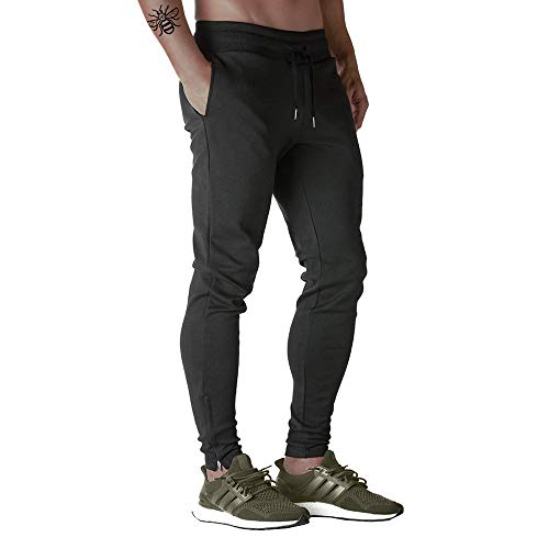 Nikaro Pantalones deportivos para hombre con doble bolsillo y cremalleras en el tobillo, color negro