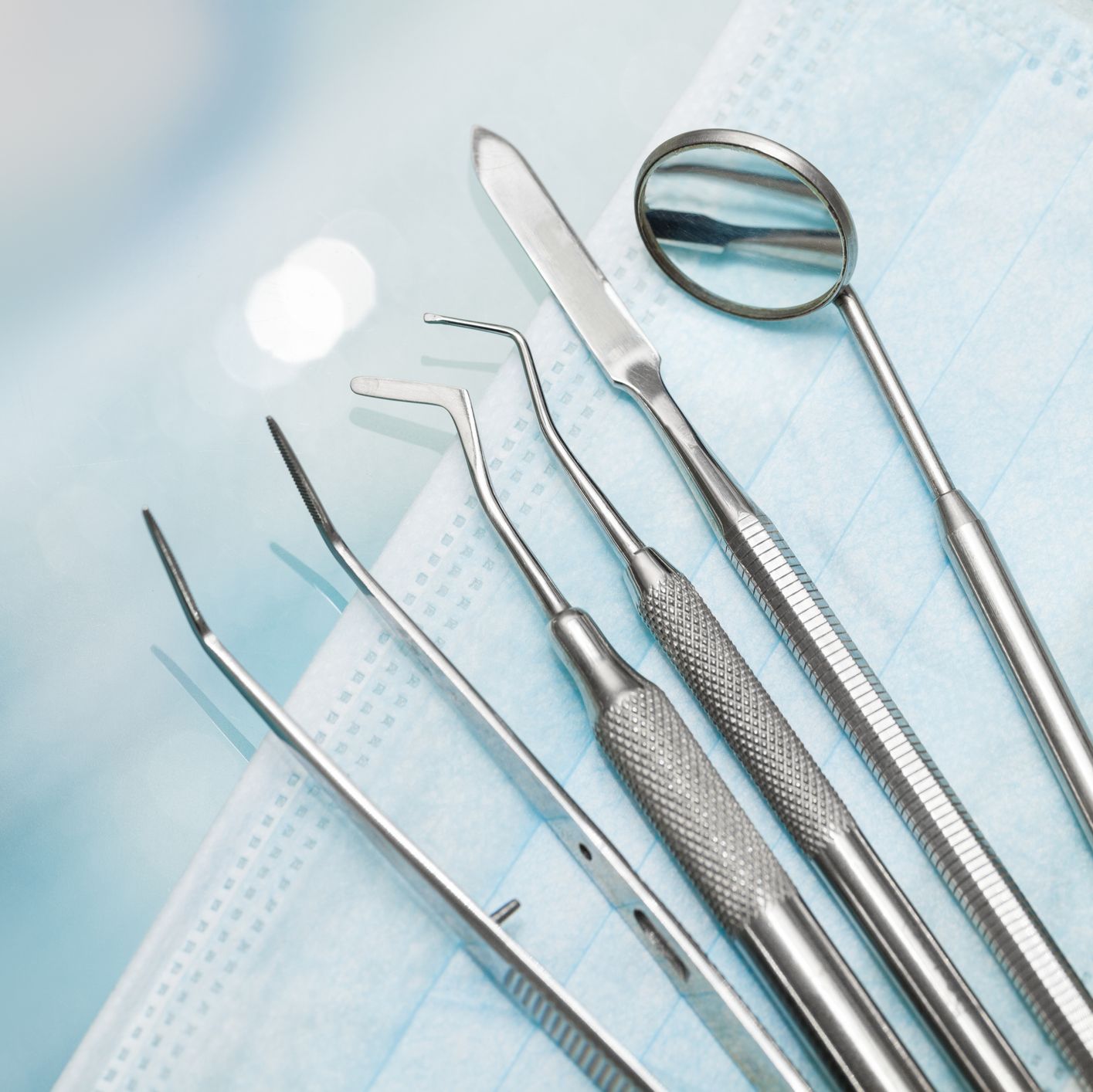 set of metal dentist's medical equipment tools