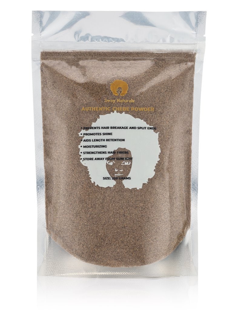Photo of a sack of chebe powder. the plastic bag has an illustration of a woman with an afro