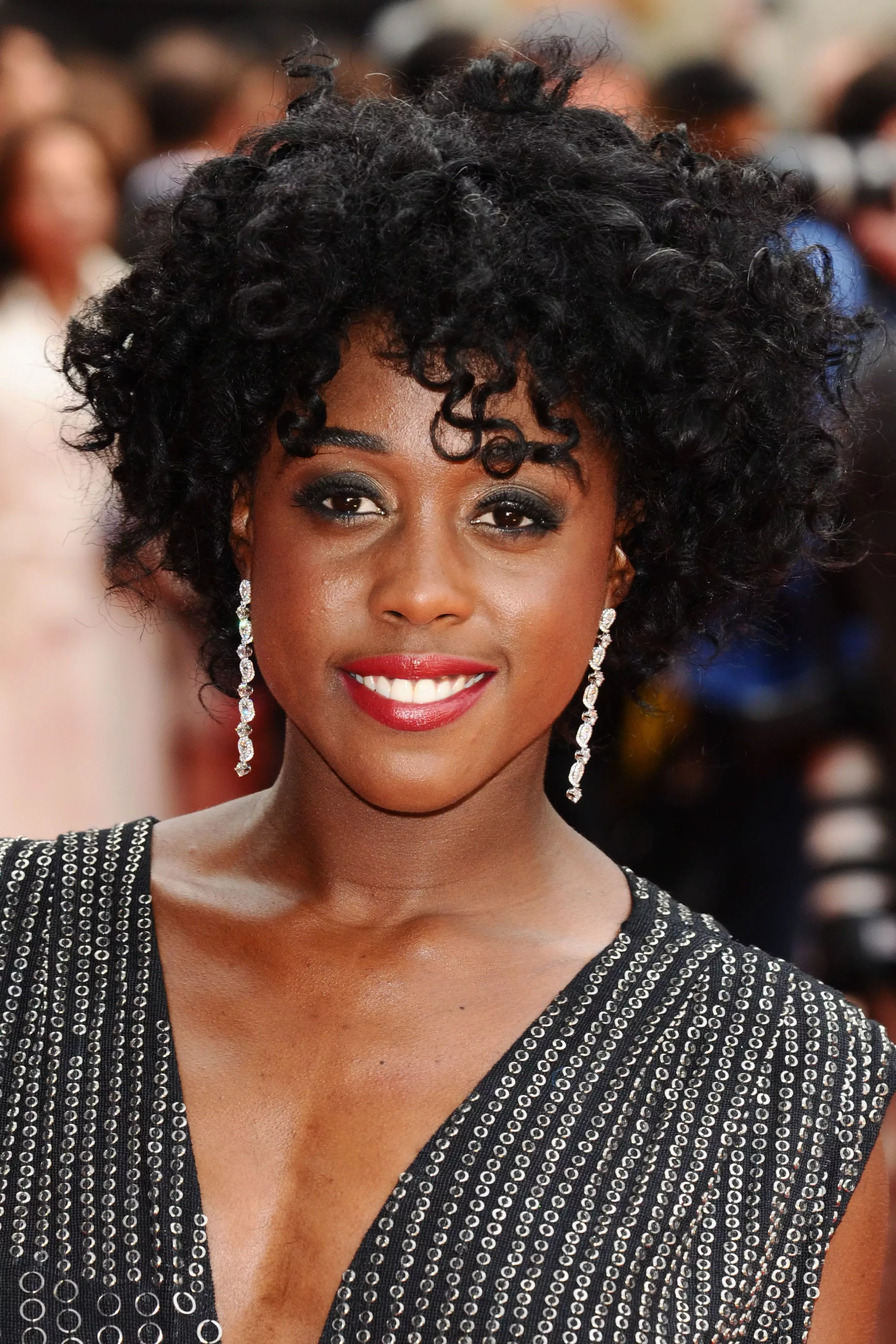 Lashana Lynch’s Messy Round Afro