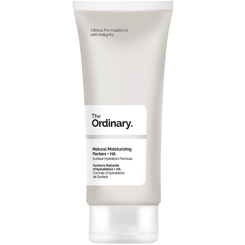 A silver tube of The Ordinary Natural Moisturizing Factors + HA on white background