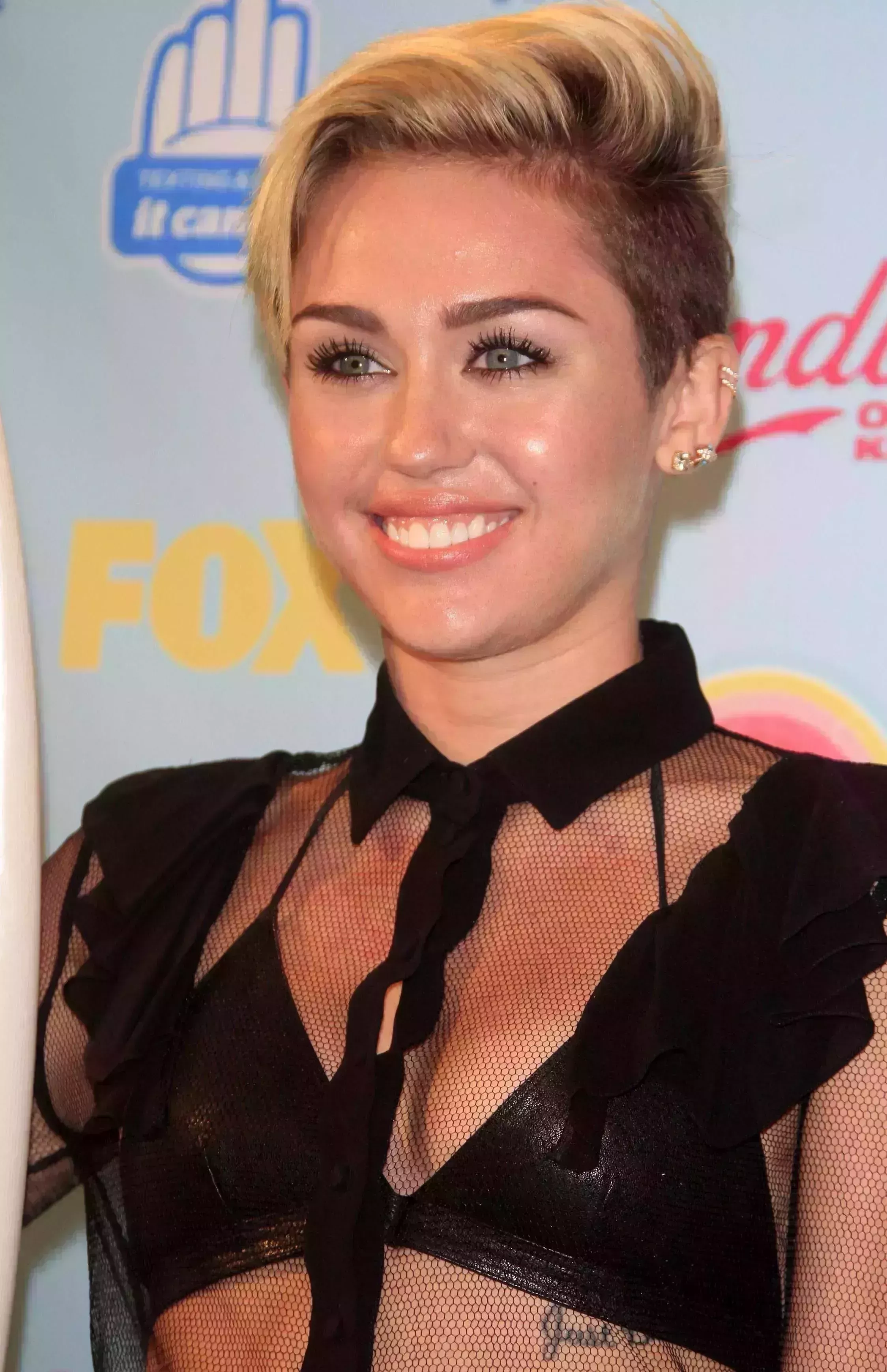 Miley Cyrus with her Blonde Side Parted Undercut