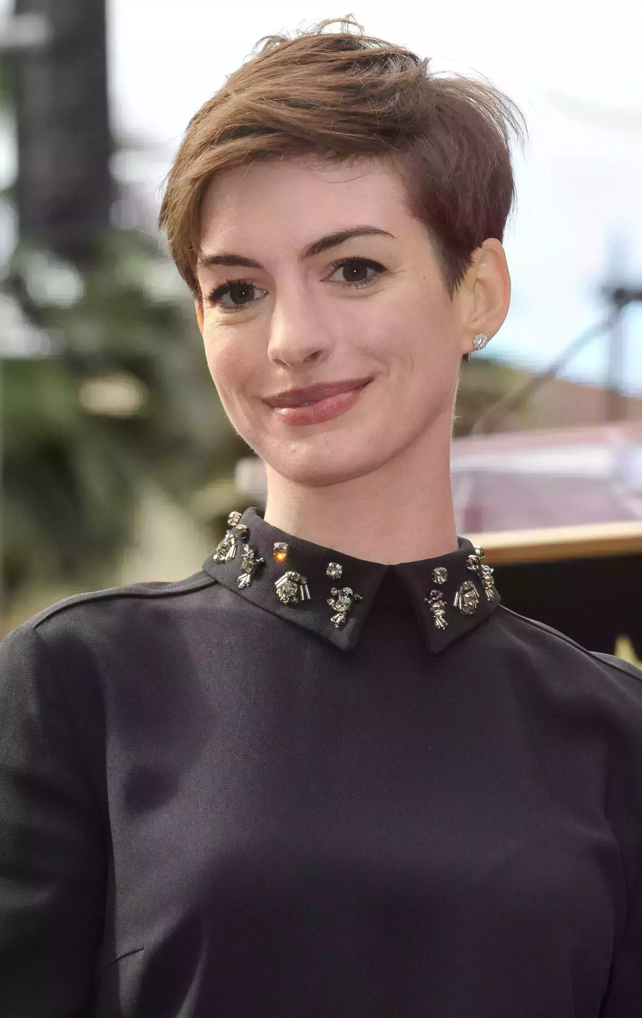 Anne Hathaway with Her Subtle Side Part Charm
