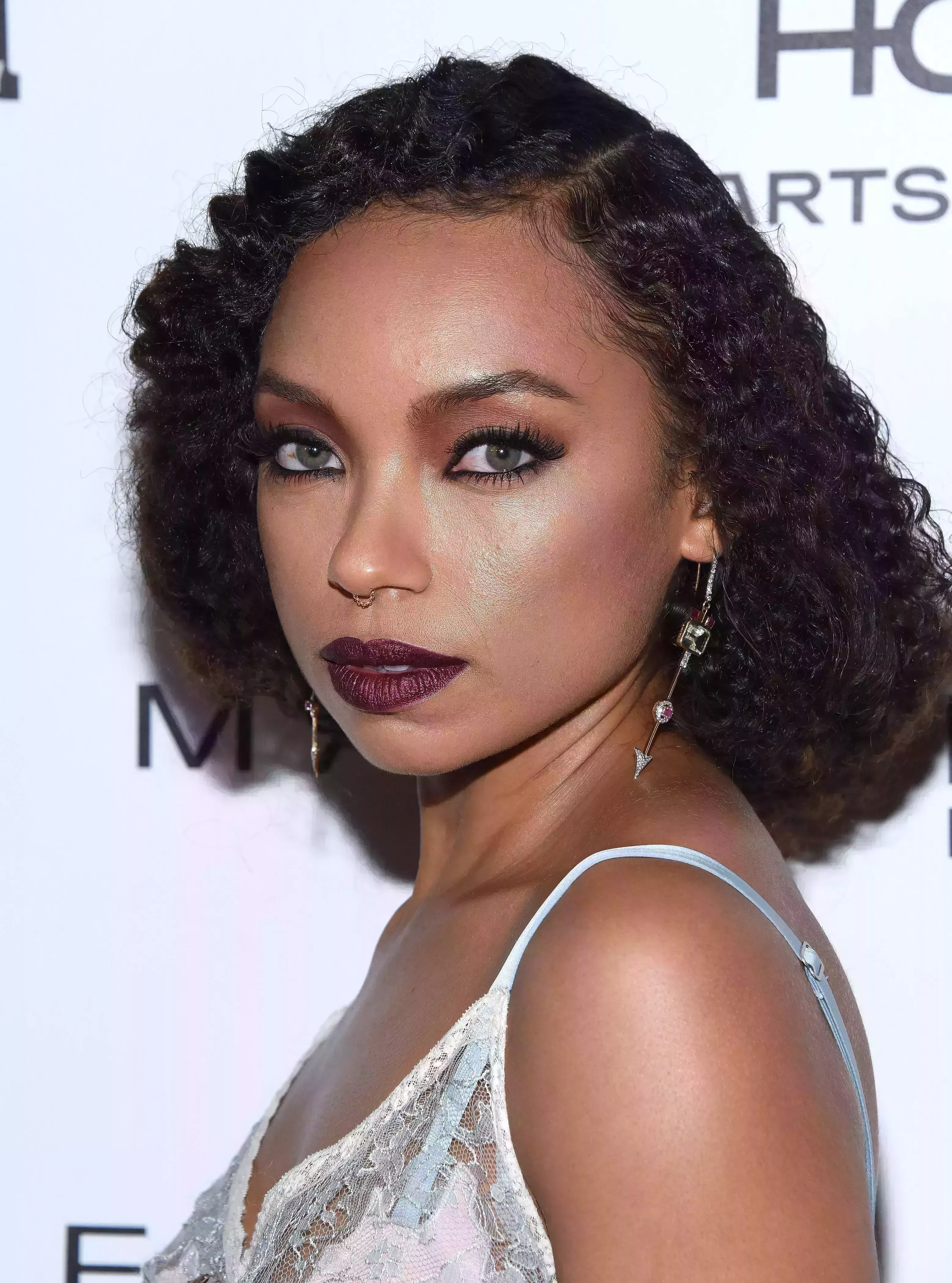 Logan Browning’s Curly Bob