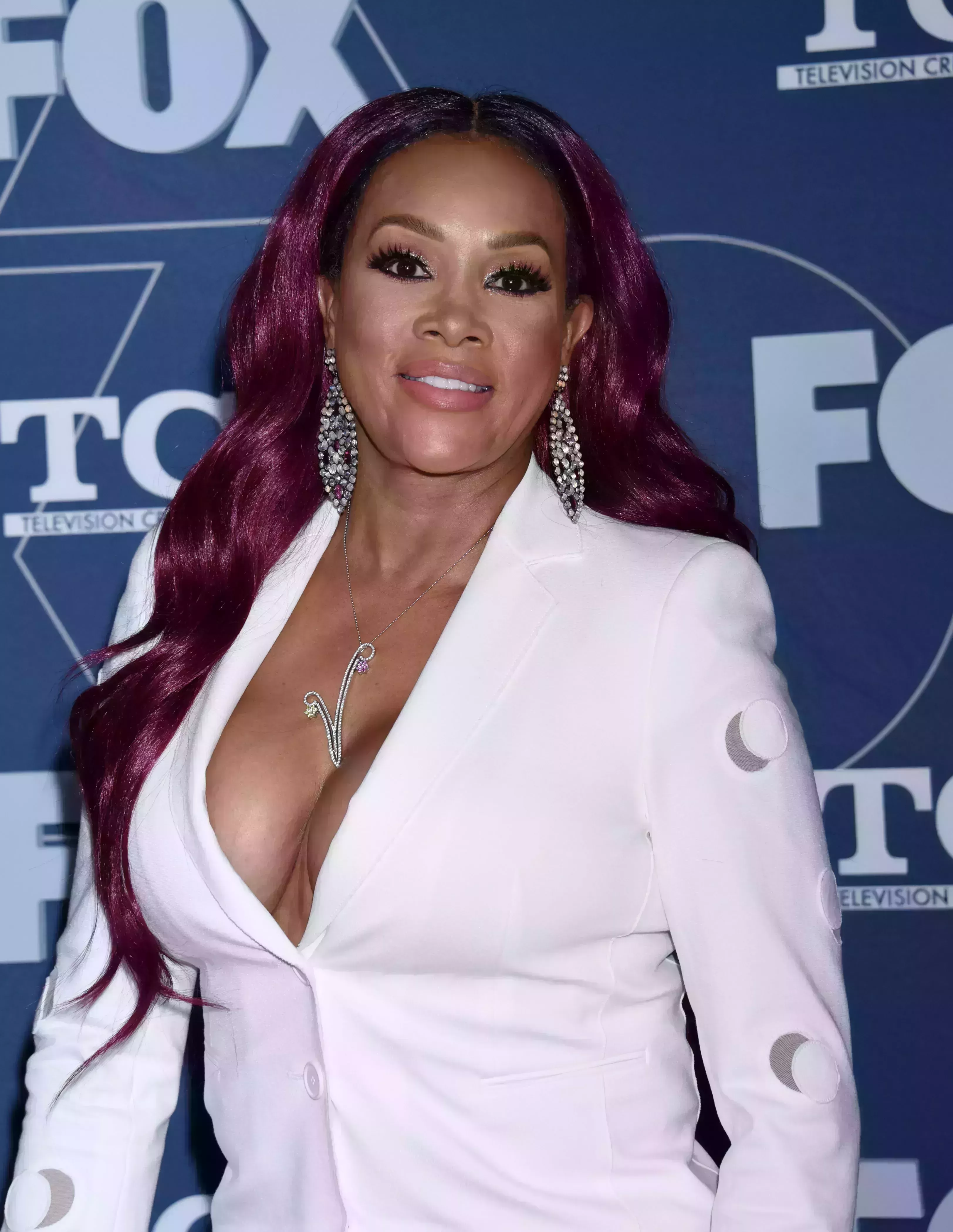 Vivica Fox’s Purple Highlights on Black Hair